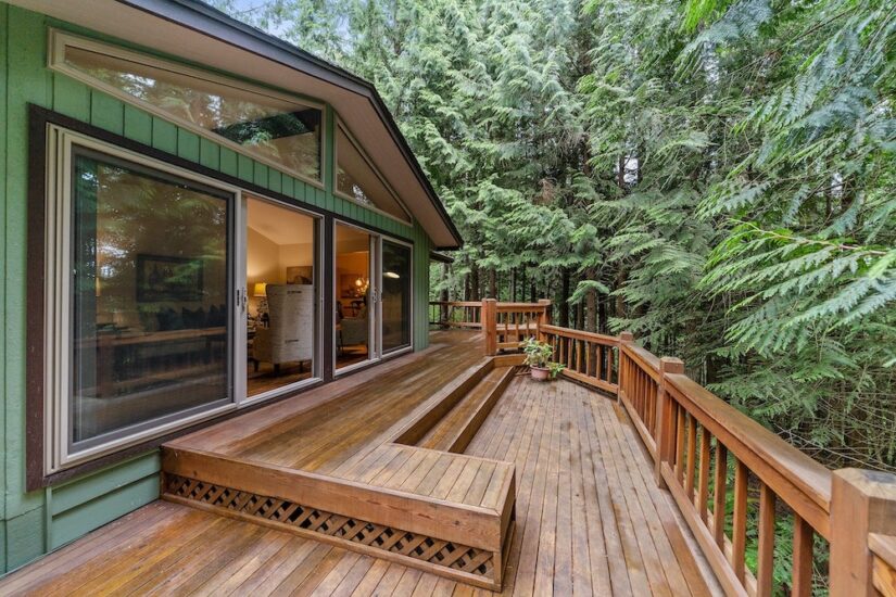 Wooden deck of a house by the woods