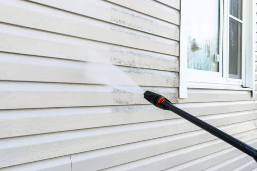 Cleaning Wall With A Pressure Cleaning Device