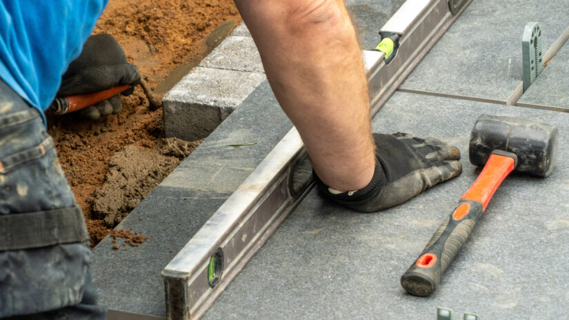 Photo of Workman Laying Patio