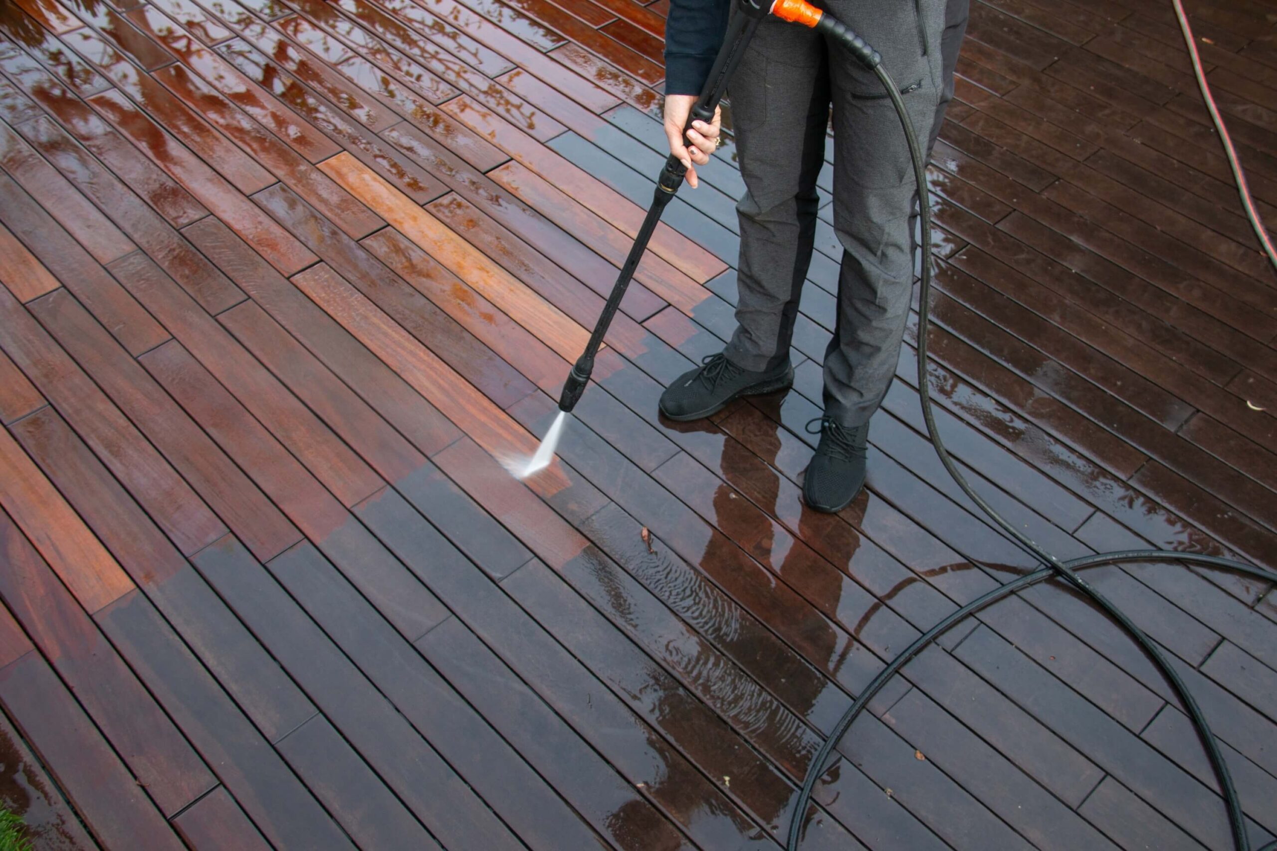 Pressure washing wood deck